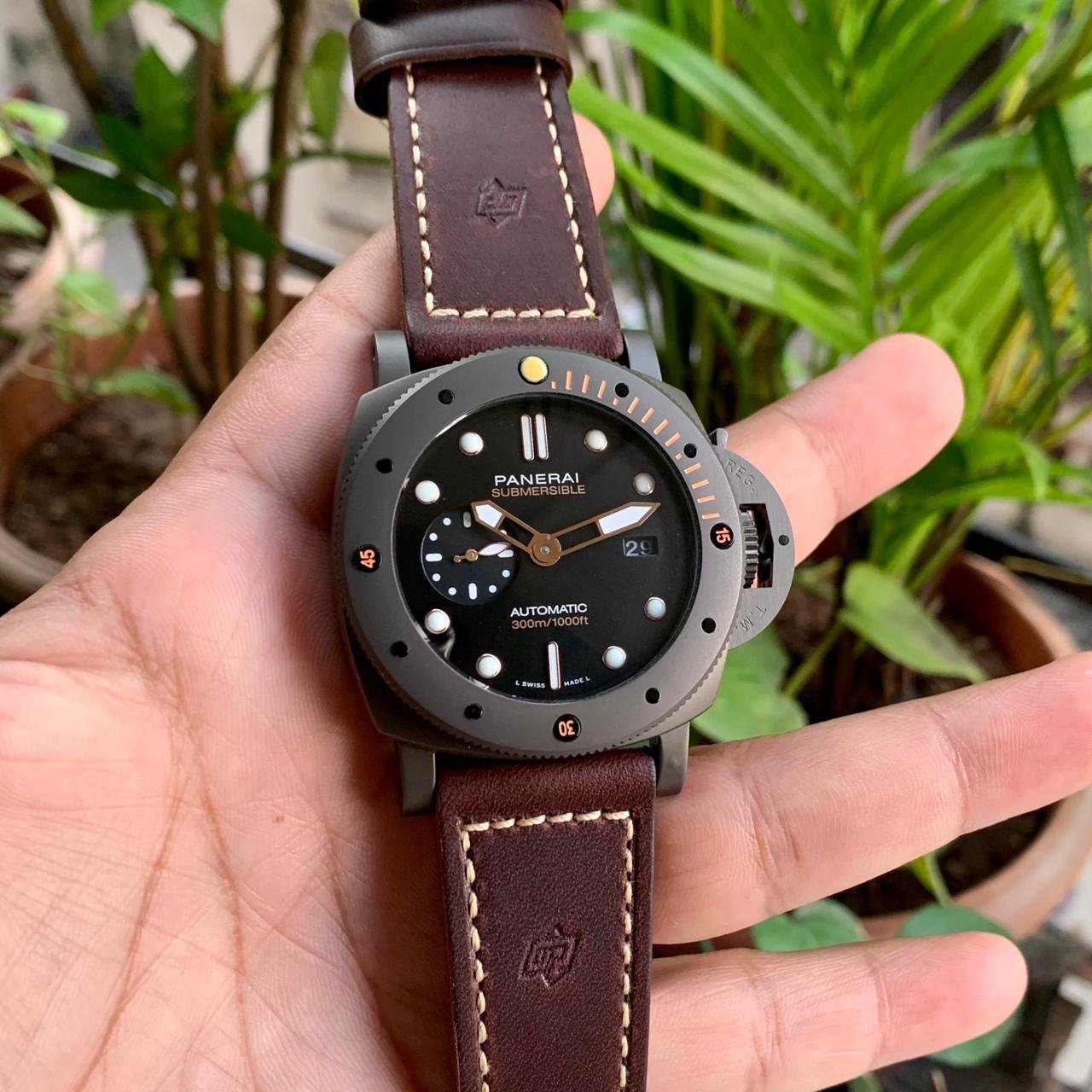 black dial automatic watch leather strap