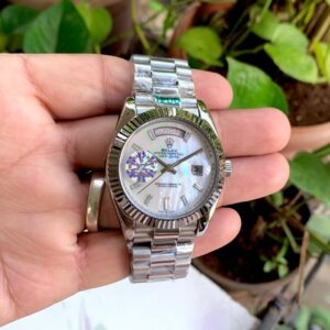white dial fluted bezel automatic