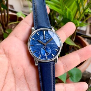blue dial automatic watch with blue strap