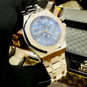blue chronograph dial with silver chain