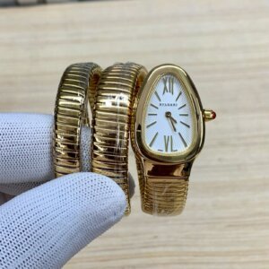 white dial watch with gold chain