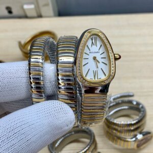 white diamond bezel watch with two tone chain
