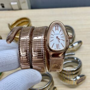 white dial watch with rosegold chain
