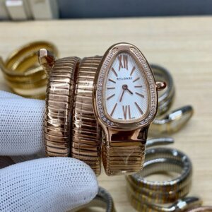 white diamond bezel watch with rosegold chain