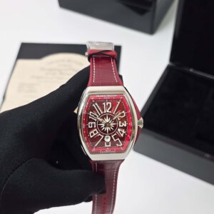 red dial watch with red strap