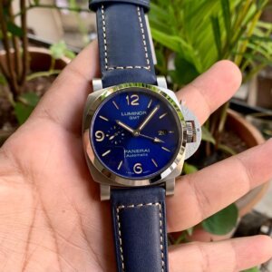 silver bezel with blue strap