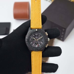 black chronograph with yellow strap