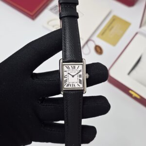 white dial with black leather strap